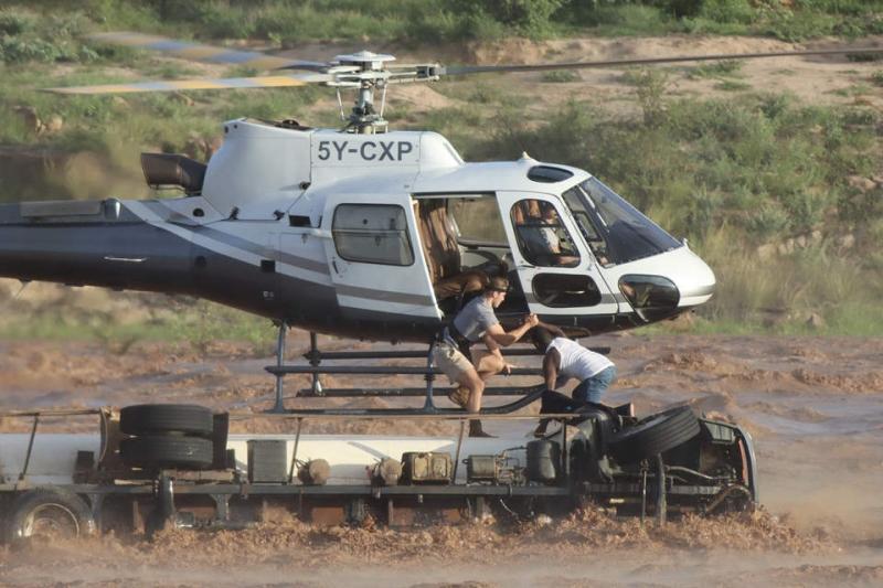Sheldrick Wildlife Trust chopper rescuing a trapped driver.
