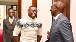 President Ruto having a chat with Ferdinand Omanyala at State House.