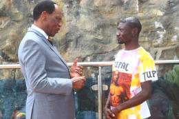 MCSK boss Ezekiel Mutua interacting with Stivo Simple Boy.