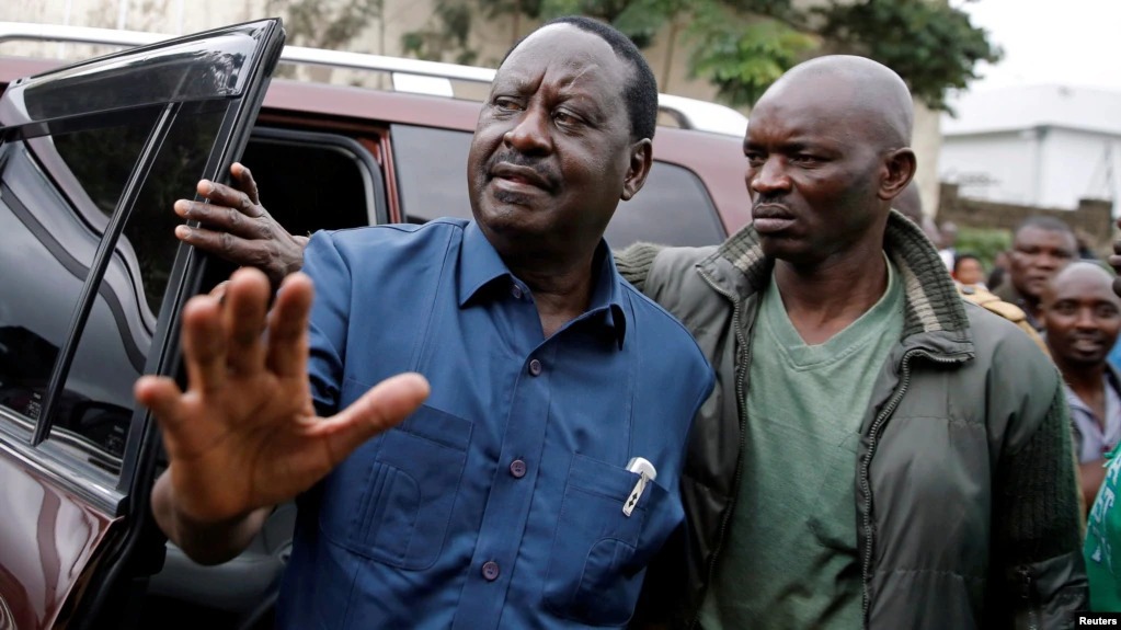 File Image of ODM leader Raila Odinga accompanied by his bodyguard Maurice Ogeta.