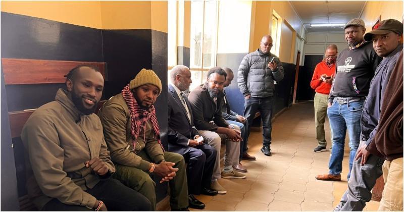 Boniface Mwangi and other activists at the Nairobi Central Police Station.