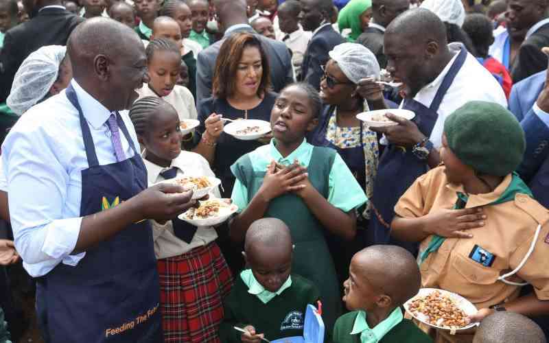 President William Ruto and Governor Johnson Sakaja during the launch of the school feeding programme.