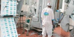 A staffer inside a Brookside Dairies factory.