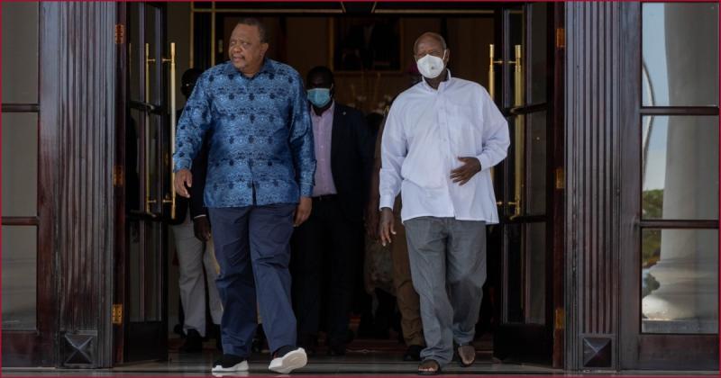 Kenya's retired president Uhuru Kenyatta with Ugandan leader Yoweri Museveni.