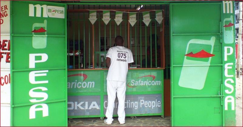 A customer at an Mpesa outlet.