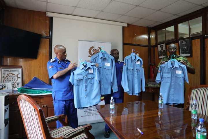 National Police Service Commission officers display the new uniform.