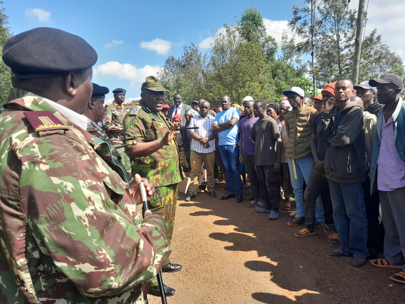 Kiambu County police commander Perminus Kioi addressing Gachugi village residents on Tuesday after the incident.