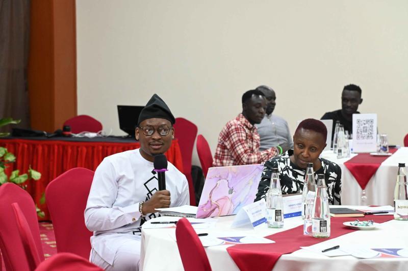 Mr Adeboye Adegoke, Senior Manager Grants and Programs Strategy at Paradigm Initiative, and Ms Christine Nguku during the training of online content creators.