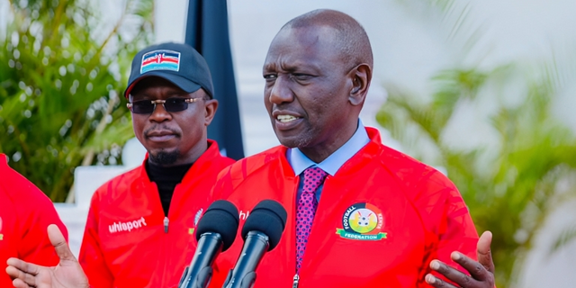 File image of President William Ruto and Sports CS Ababu Namwamba.