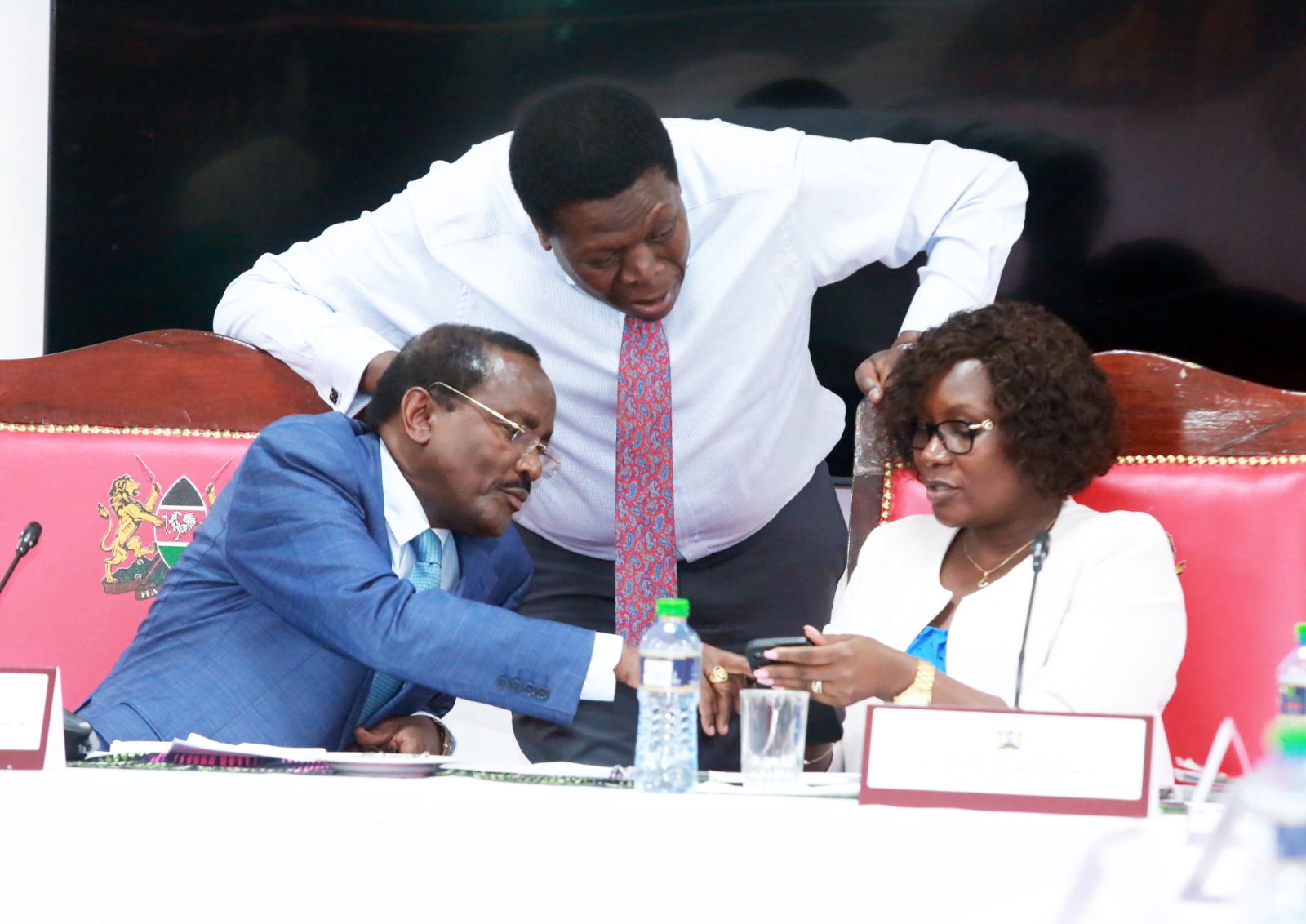 Wiper Leader Kalonzo Musyoka, and Governor Cecily Mbarire engaging DAP-K leader Eugene Wamalwa.