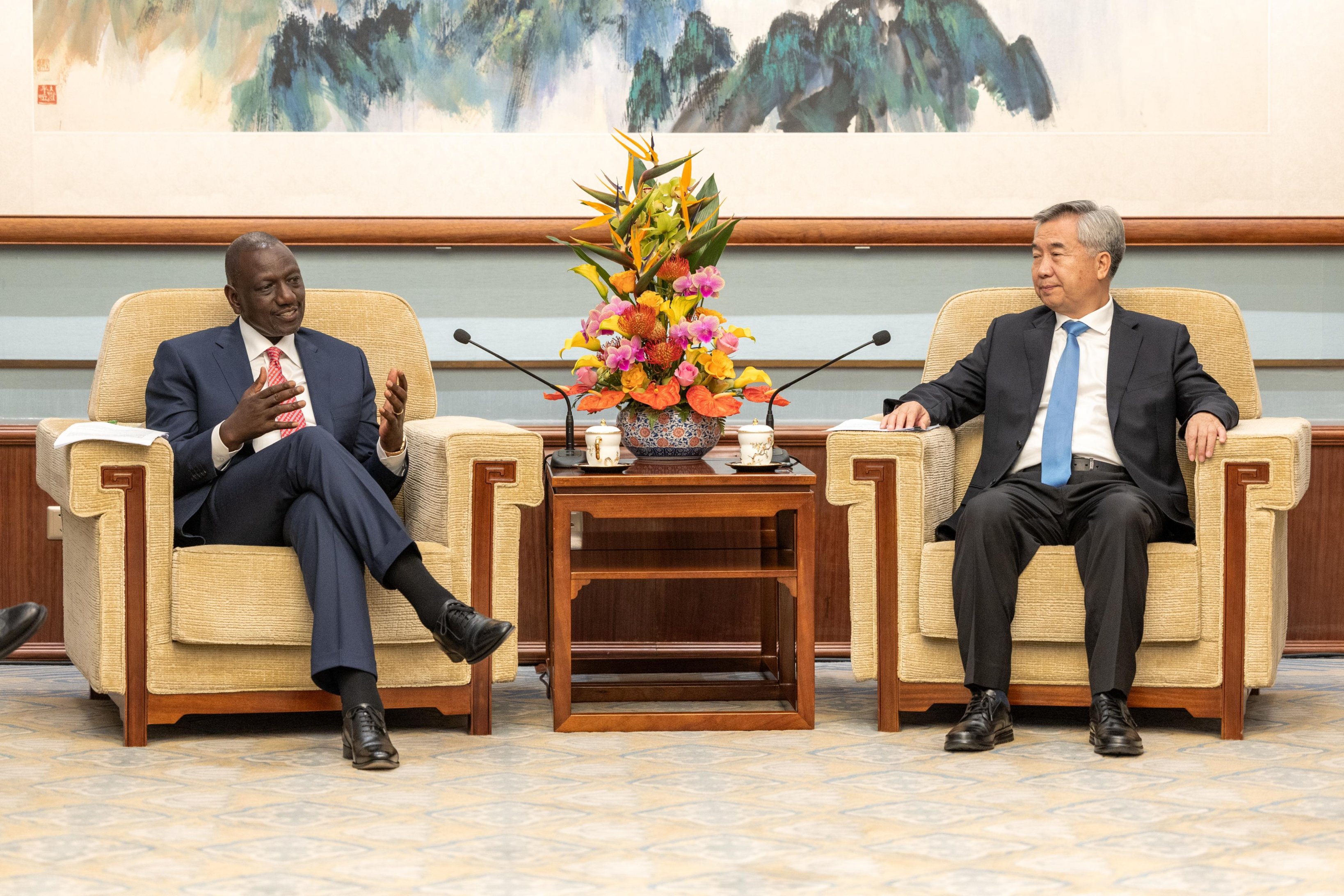 President William Ruto with Mr LI Xi, a senior member of China's Communist Party Political Bureau.