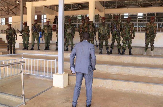 A contingent of GSU officers surround the offices of Governor Simba Arati.