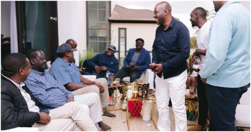 File image of Saboti MP Caleb Amisi with Azimio leader Raila Odinga.