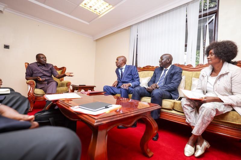 President Ruto receives a briefing on the 2023 KCSE results from Machogu and the team.