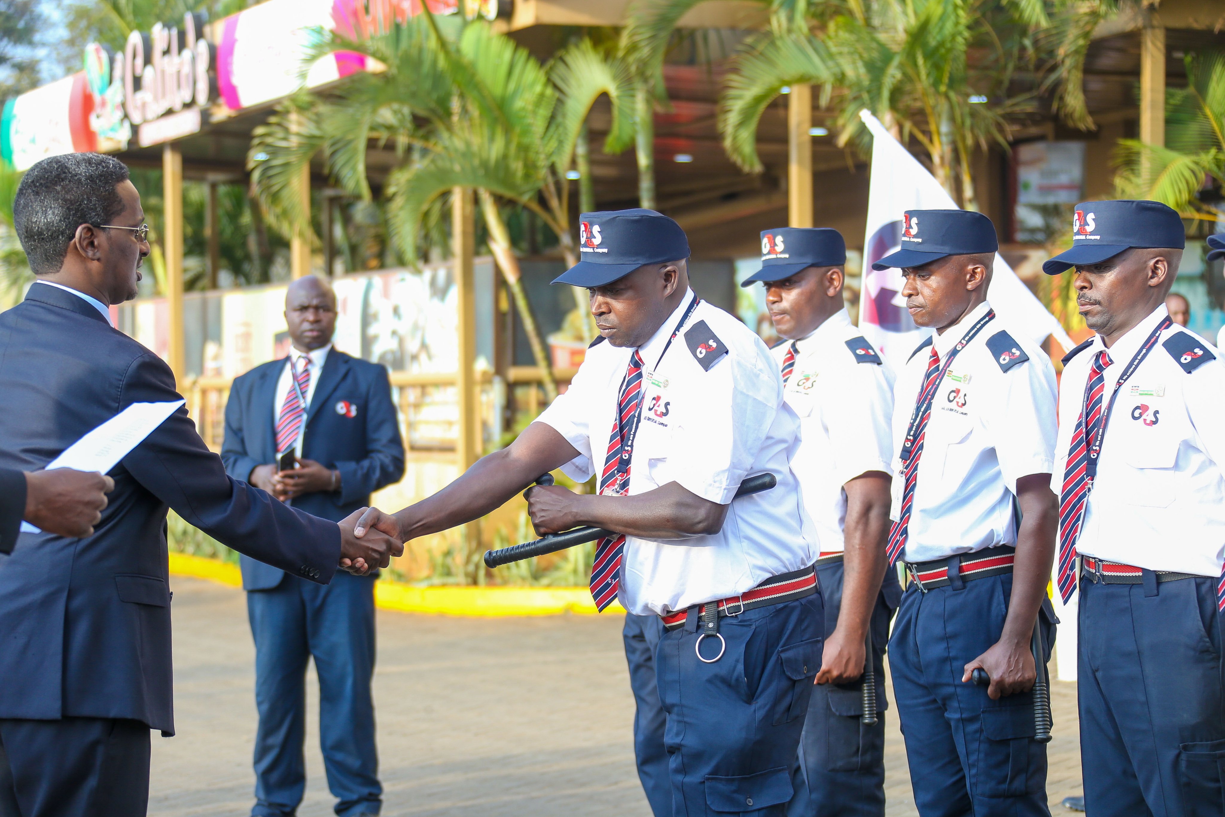 File image of PRSA CEO Fazul Mahamed with G4S security firm personnel.