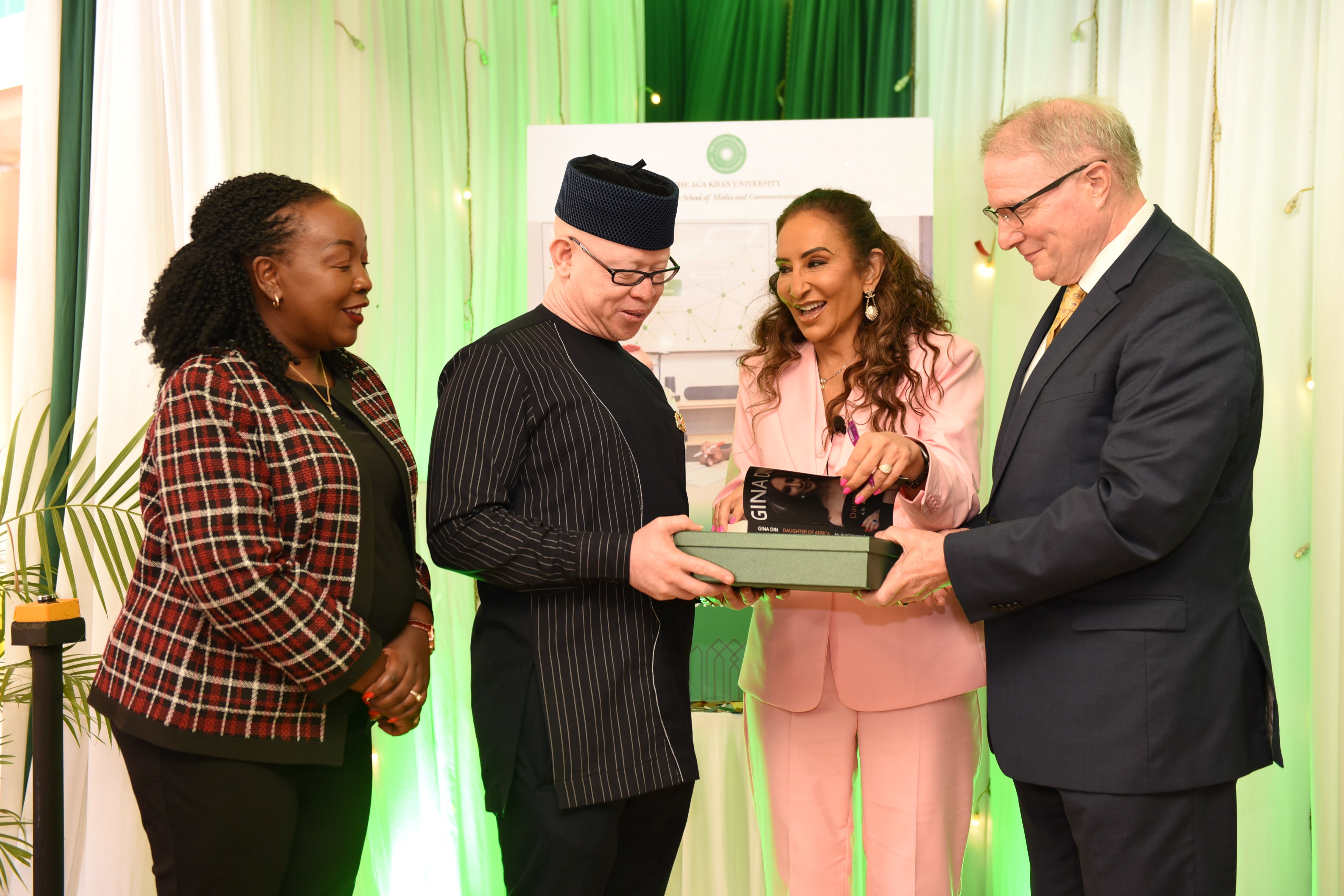 Aga Khan University (AKU) GSMC Dean Prof. Nancy Booker, Government Spokesperson Isaac Mwaura, Gina Din Group Founder and Executive Chair Gina Din, and AKU Provost and Vice President Academics Dr. Carl Amrhein pose for a photo.