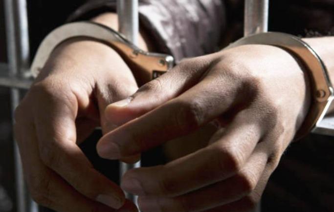 File image of a man in handcuffs