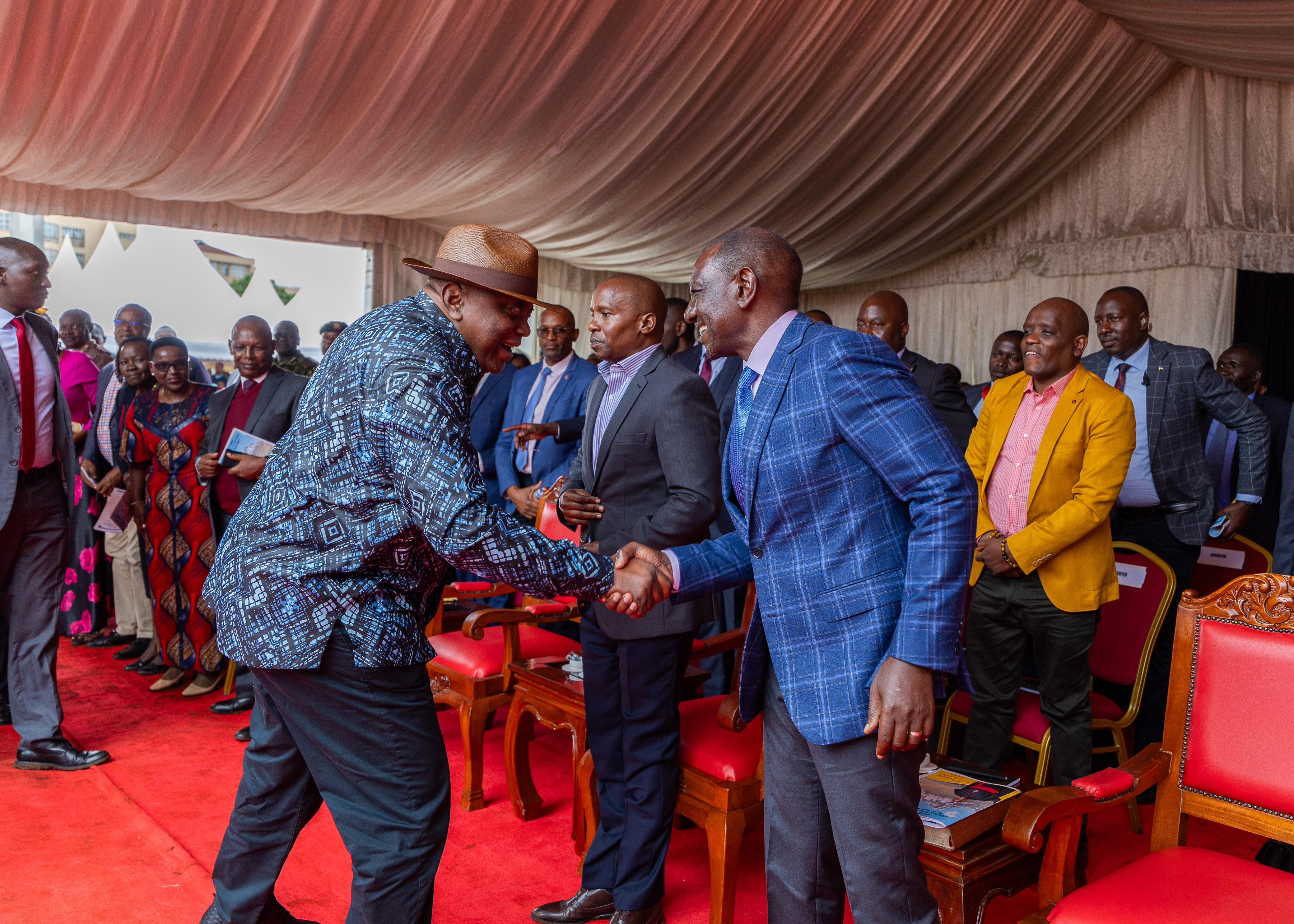 Former president Uhuru Kenyatta with his successor William Ruto in Embu.