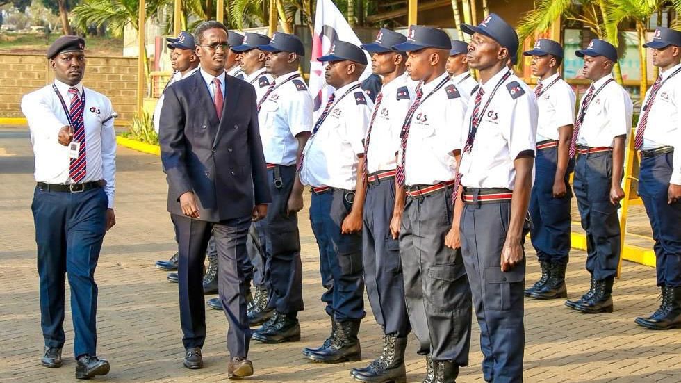 PSRA CEO Fazul Mohamed inspecting a G4S guard of honour