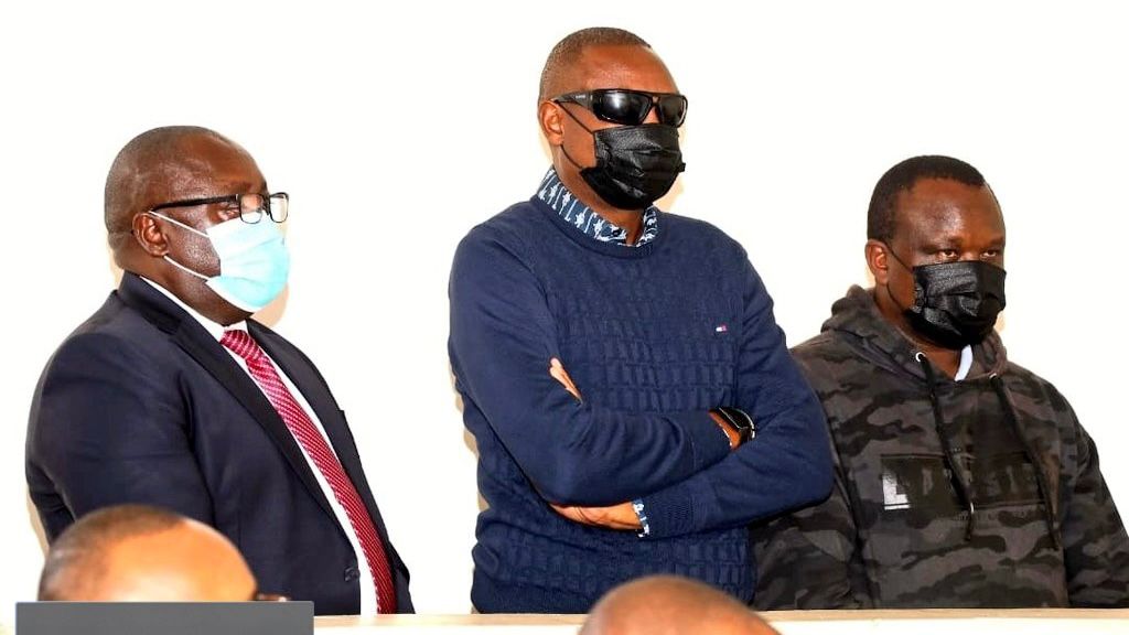 File image of three government officials in court