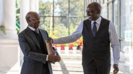 File image of SK Macharia and President William Ruto