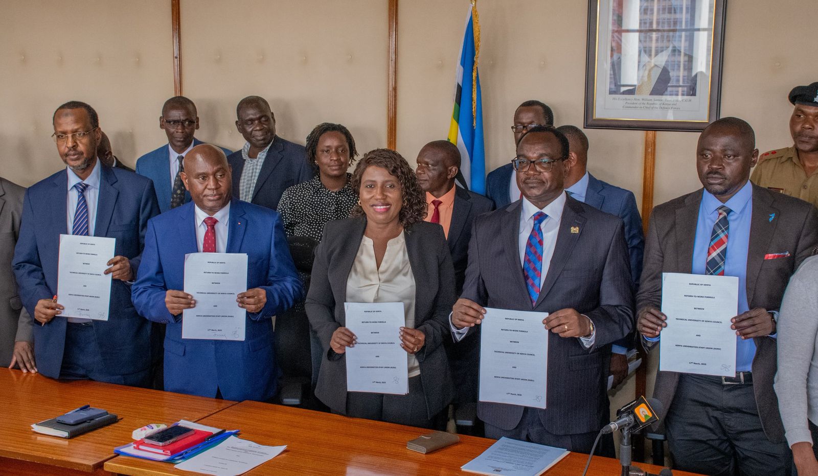 File image of Education CS Julius Ogamba alongside UASU and KUSU officials