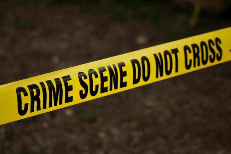 Stock image of Crime Scene Do Not Cross signage