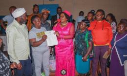 File image of MP Wamuchomba issuing bursaries in Githunguri