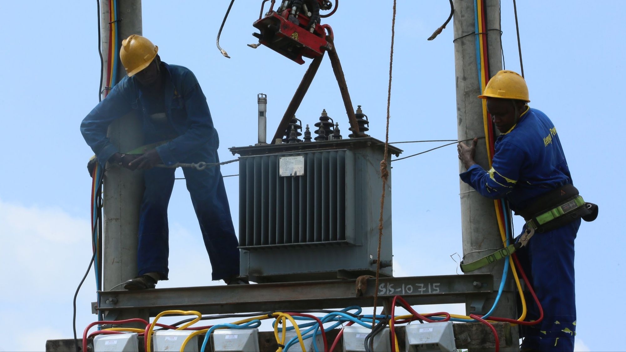 File image of Kenya Power technicians