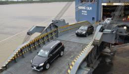 Vehicles being offloaded from a ship in Mombasa.