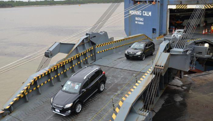 Vehicles being offloaded from a ship in Mombasa.