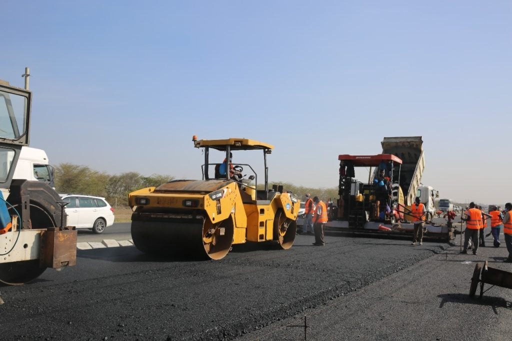 File image of workers repairing a road.