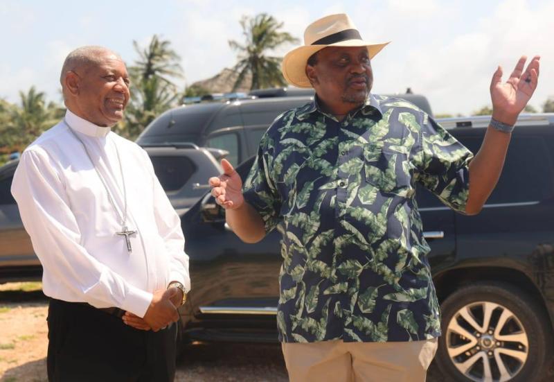 File image of Uhuru Kenyatta and Malindi Diocese Bishop Willybard Lagho.