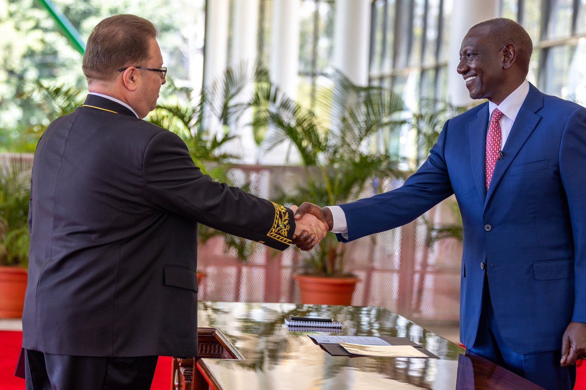 File image of President William Ruto with Russian Ambassador to Kenya Vsevolod Tkachenko.