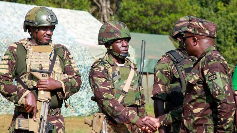 File image of Major General Luka Kutto interacting with KDF soldiers