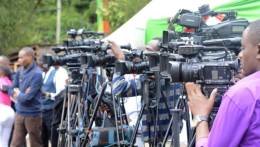 A group of journalists during a public address.