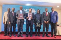 File Image of CS Lee Kinyanjui, COMESA's Dr Dev Haman, and other dignitaries during the signing of the host agreement.