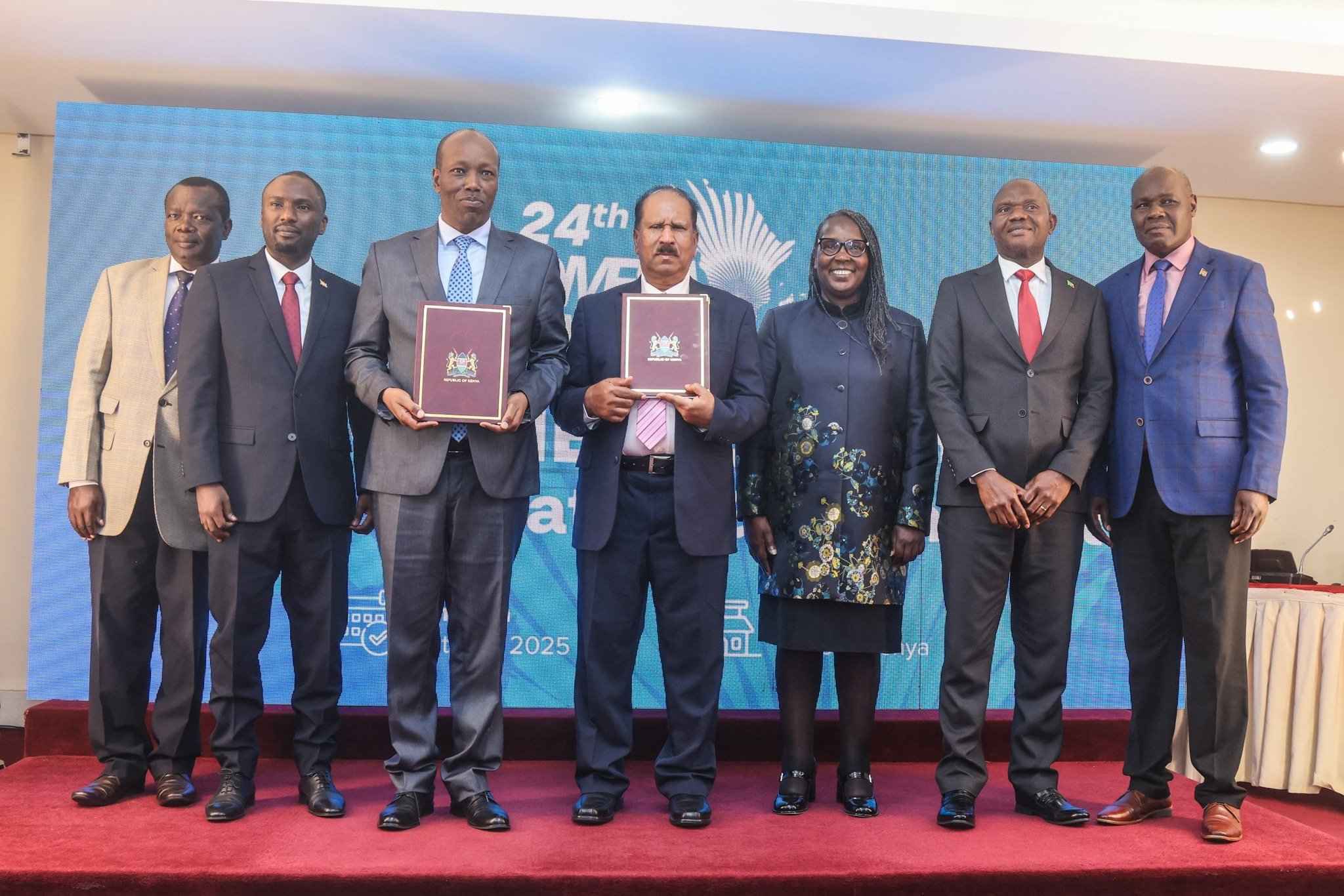 File Image of CS Lee Kinyanjui, COMESA's Dr Dev Haman, and other dignitaries during the signing of the host agreement.