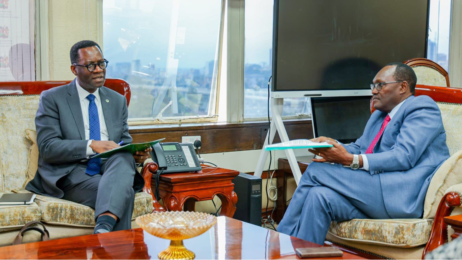 File image of Treasury Principal Secretary Chris Kiptoo and AfDB Director General for the Regional Development and Business Delivery Office for East Africa Alex Mubiru