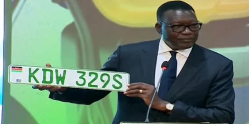 File image of Transport Cabinet Secretary Davis Chirchir displaying the new EV number plates