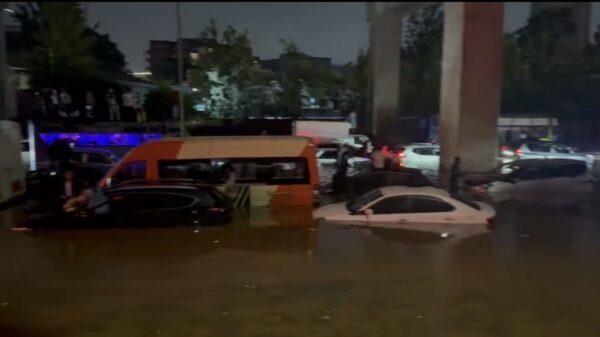 Vehicles submerged on a Nairobi road.