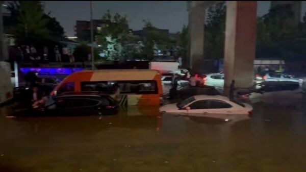 Vehicles submerged on a Nairobi road.