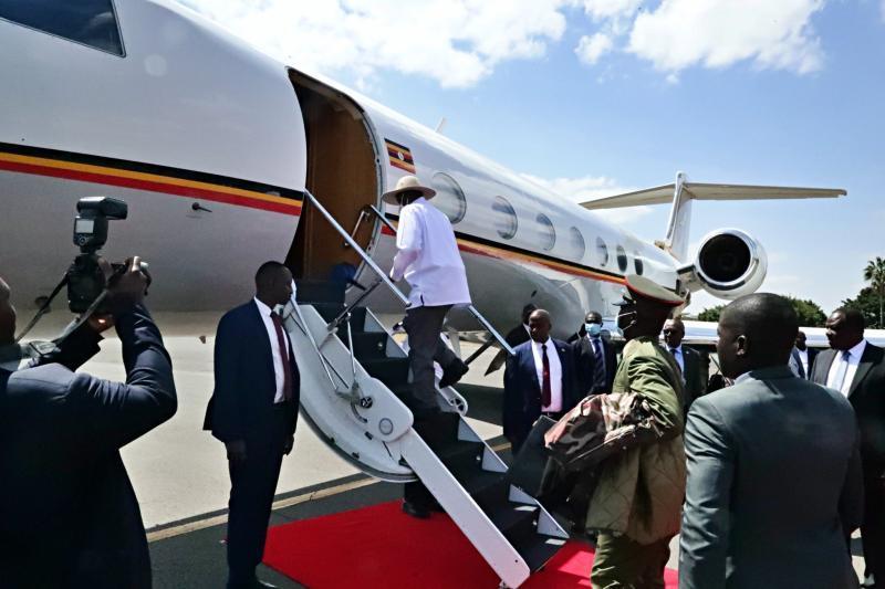 File image of President Yoweri Museveni boarding a plane.