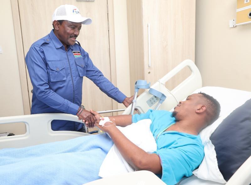 File image of Kalonzo Musyoka with Sammy Kioko at Nairobi West Hospital.