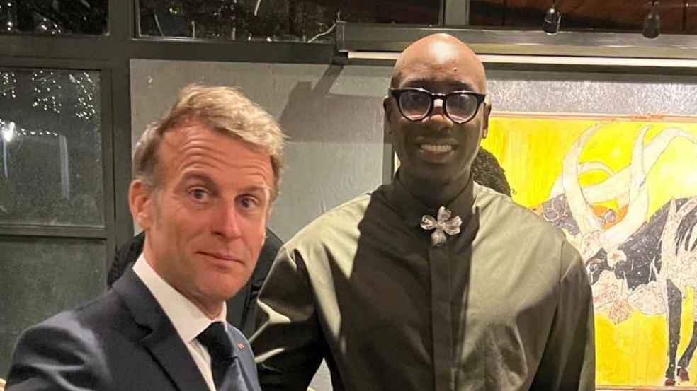 File image of French President Emmanuel Macron and singer Bien-Aimé Baraza