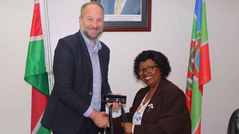 File image of Regional Public Engagement Specialist at the U.S. Embassy in Nairobi, Mark Burrell, and JKUAT Vice Chancellor Victoria Ngumi