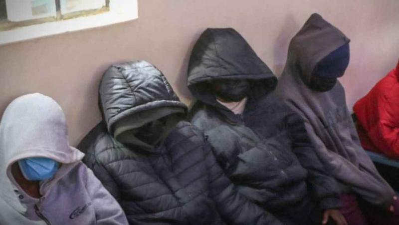 File image of the suspects in court