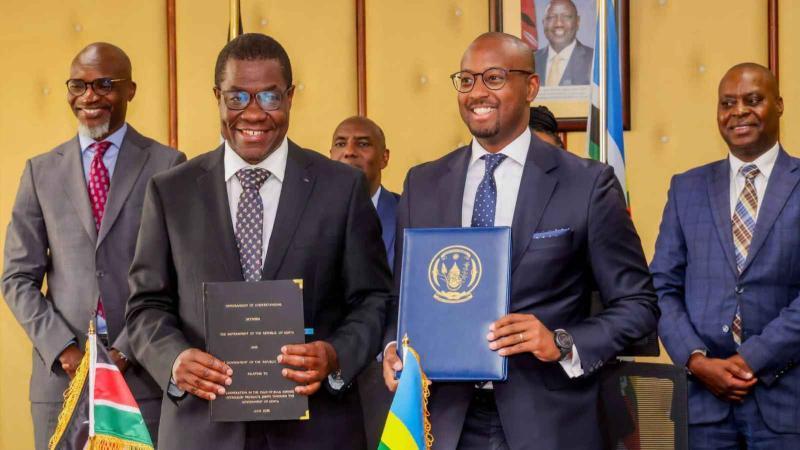 File image of Energy Cabinet Secretary Opiyo Wandayi and Rwanda's Minister of Trade and Industry Antoine-Marie Kajangwe