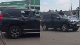 File image of individuals brandishing guna from a vehicle during the Ol Kalou by-election
