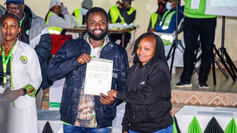 File image of Sammy Ngotho receiving his election certificate